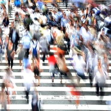 What Is Business About?: Mindset Of A Successful Business Owner Blurred image of a crowd at a zebra crossing - all potential customers
