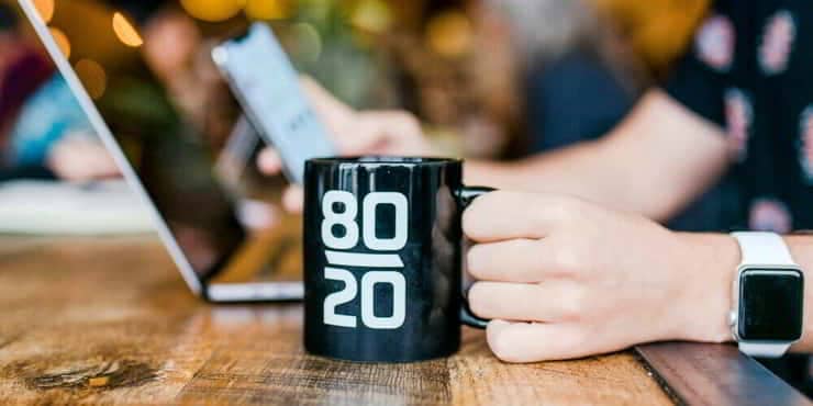 What Is The Pareto Principle In Productivity: How To Work Smarter, Not Harder A mug with 80-20 on the side - what is the pareto principle