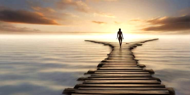 Lady about to make a decision about the next direction to take at a forking floating path - self-belief and confidence