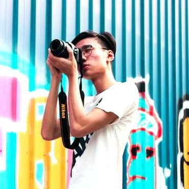 7 Ways To Find Great Business And Product Ideas Man with camera