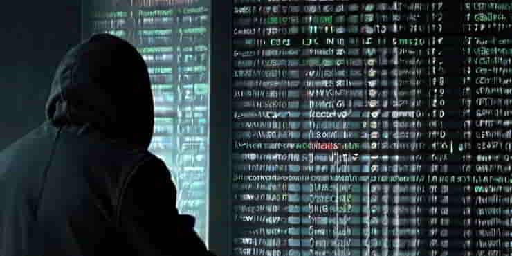 WordPress Security Tips: Protecting Your Site from Hackers A hacker in a hoody staring at a screen full of data